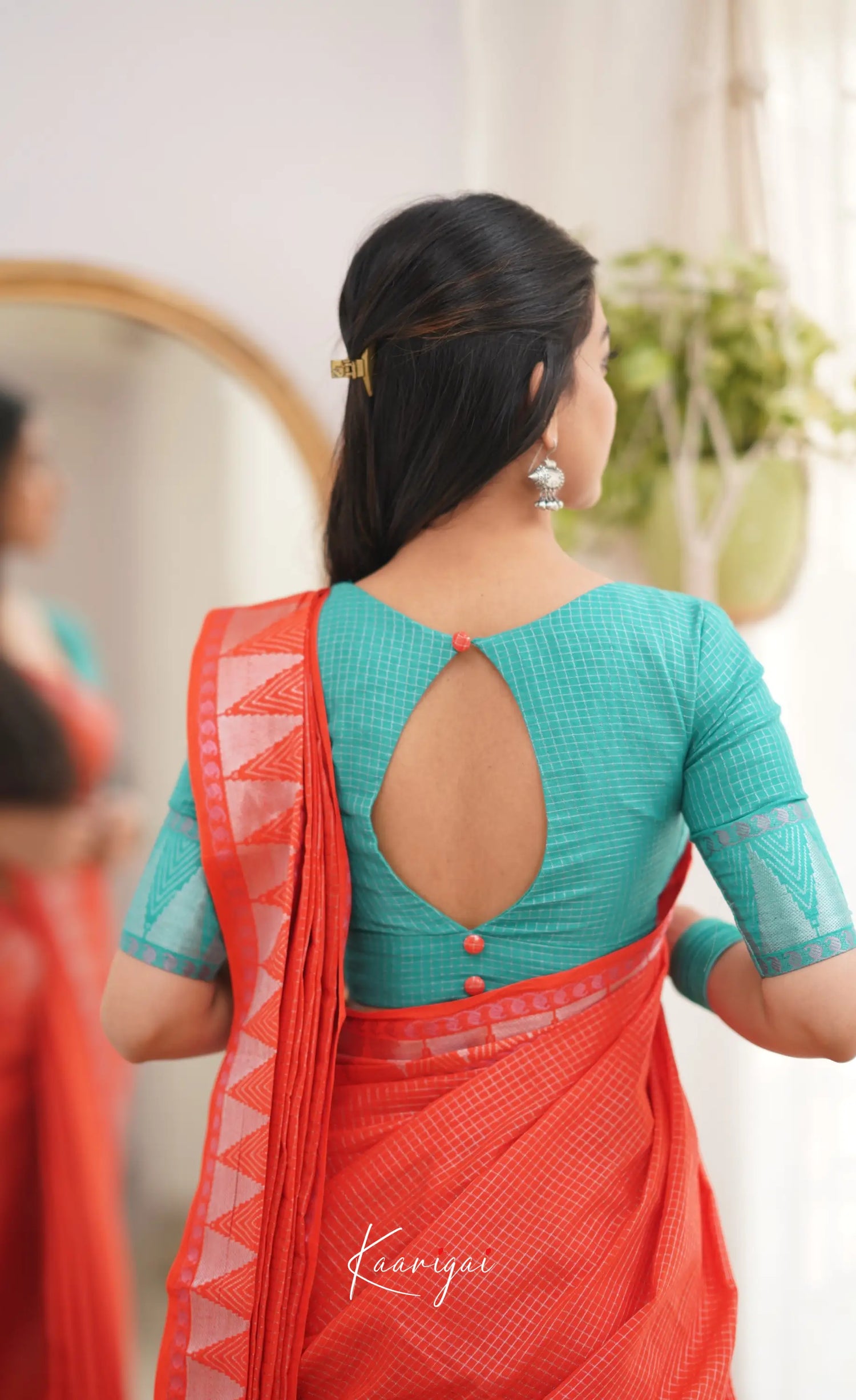Saaral Orange shade and Teal Green tone Sungudi Saree Ivalinmabia Saaral Orange shade and Teal Green tone Sungudi Saree Ivalinmabia