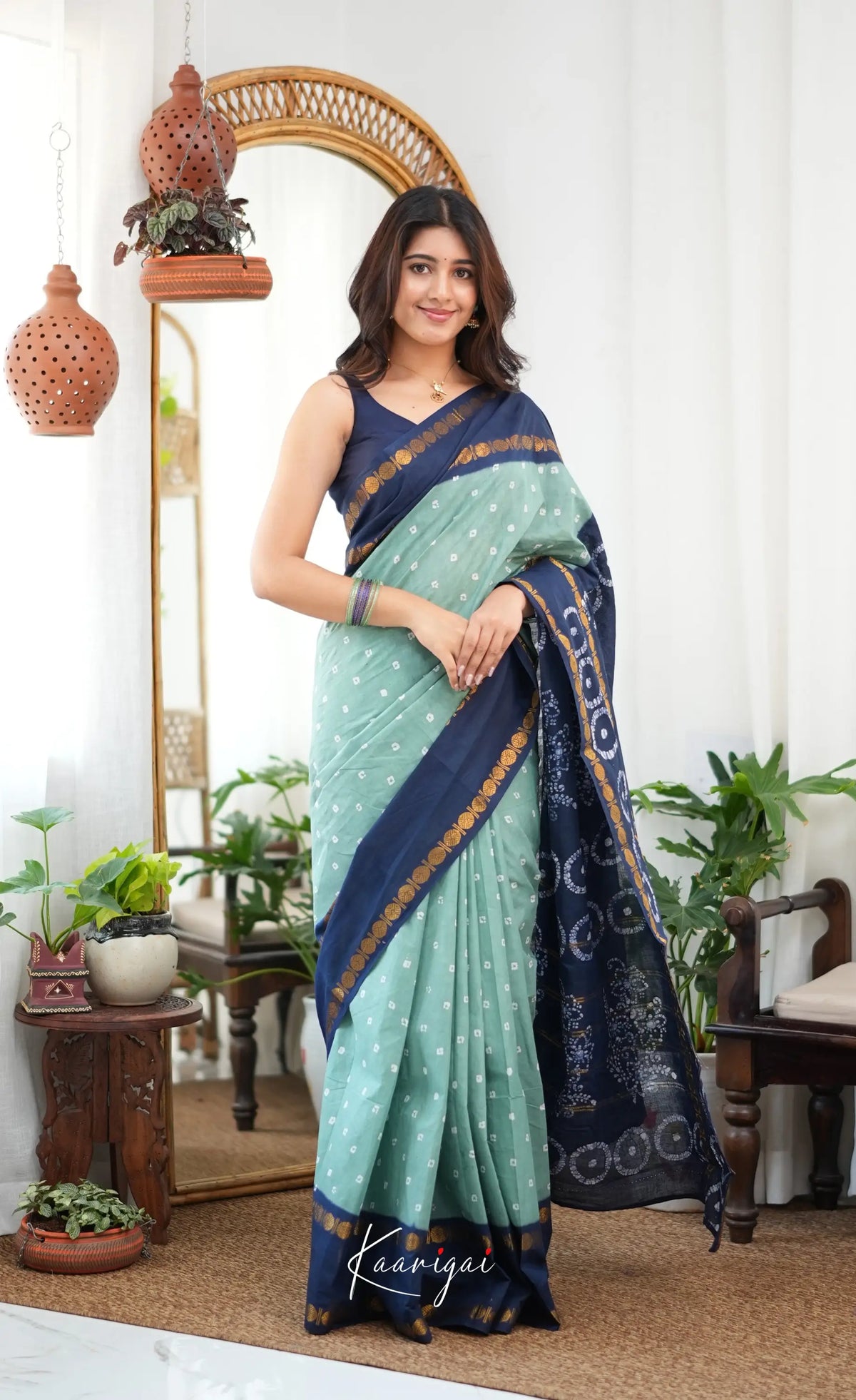 Saaral - Pale teal blue and Dark blue Sungudi Saree - Sarees