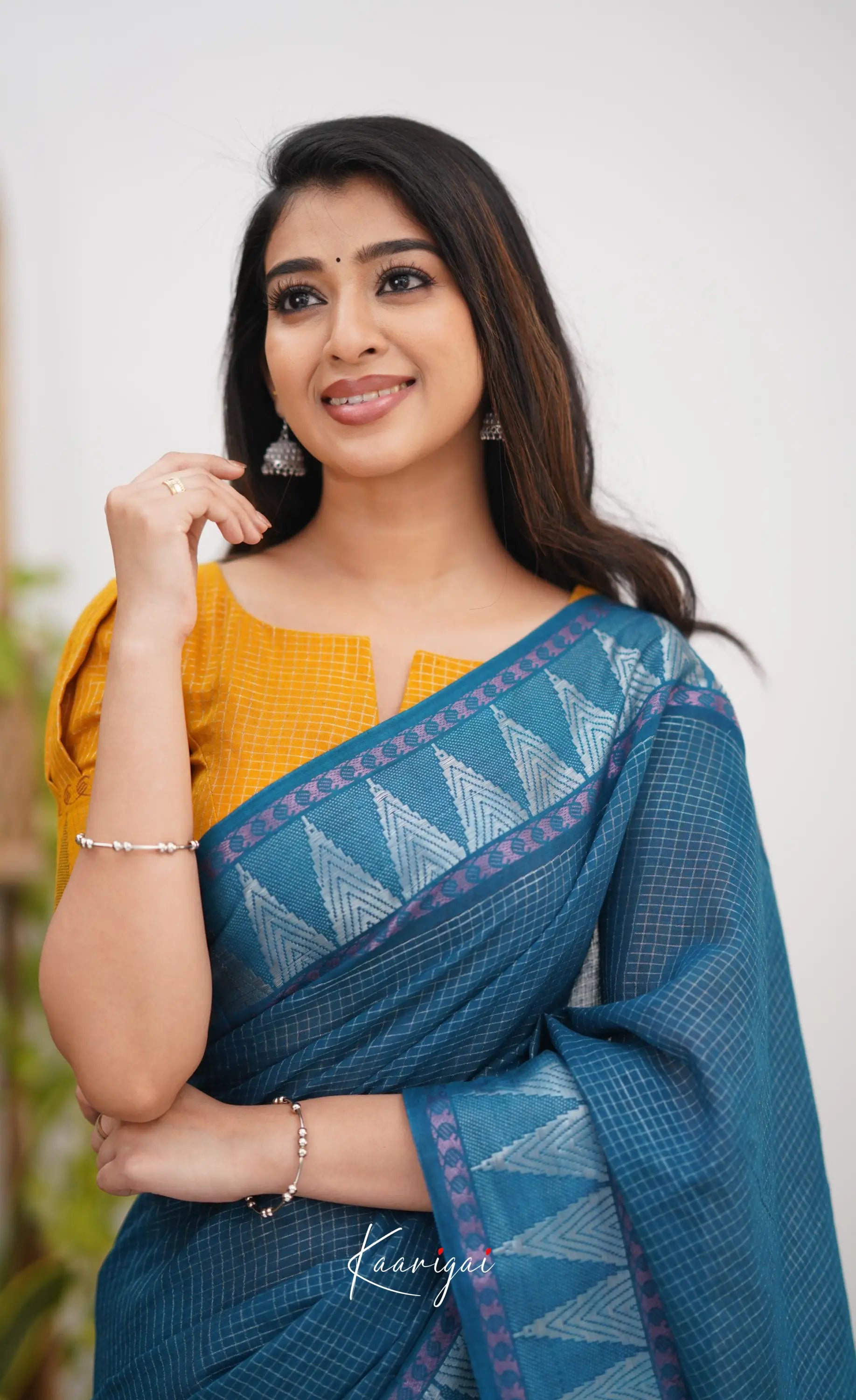 Saaral Peacock Blue Shade And Mustard Tone Sungudi Saree Sarees