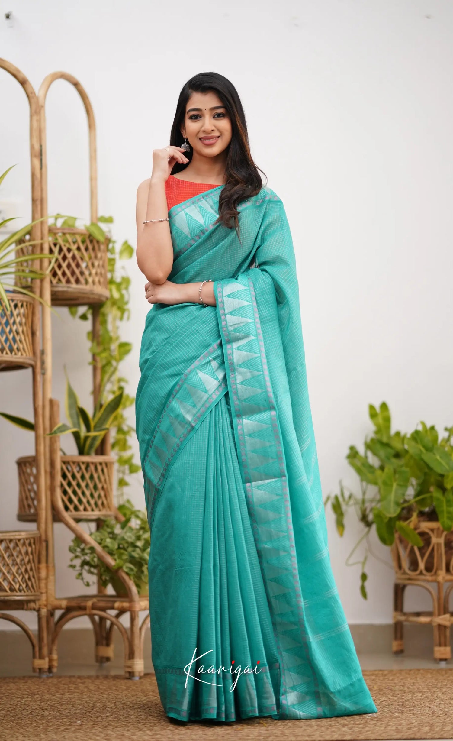 Saaral Teal Green Shade And Orange Tone Sungudi Saree Sarees