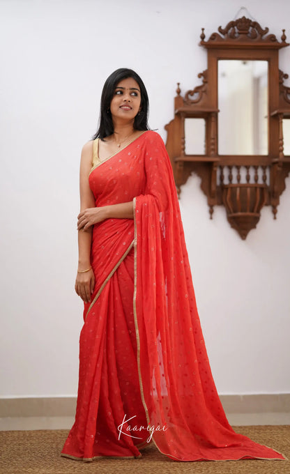 Tara- Peachish Orange Chinnon Saree Sarees