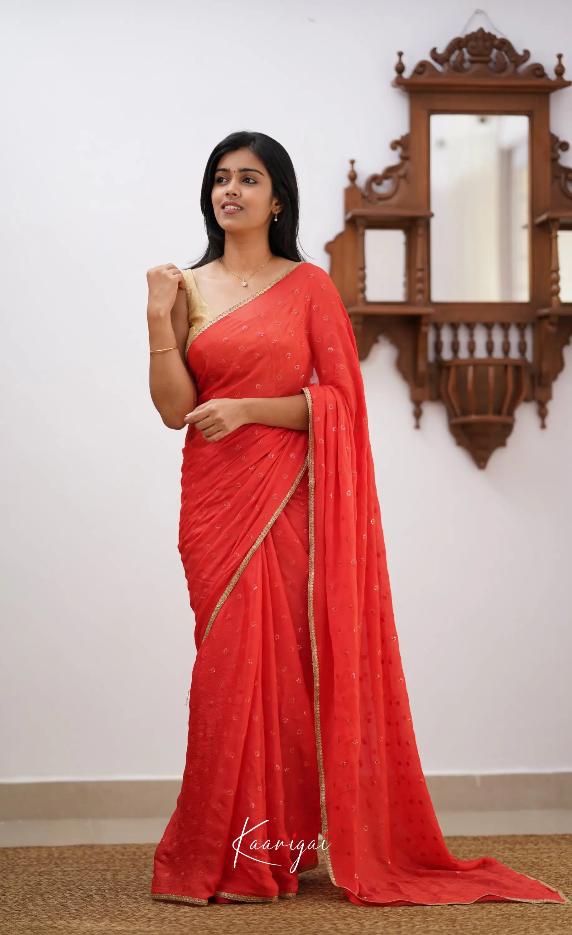 Tara- Peachish Orange Chinnon Saree Sarees