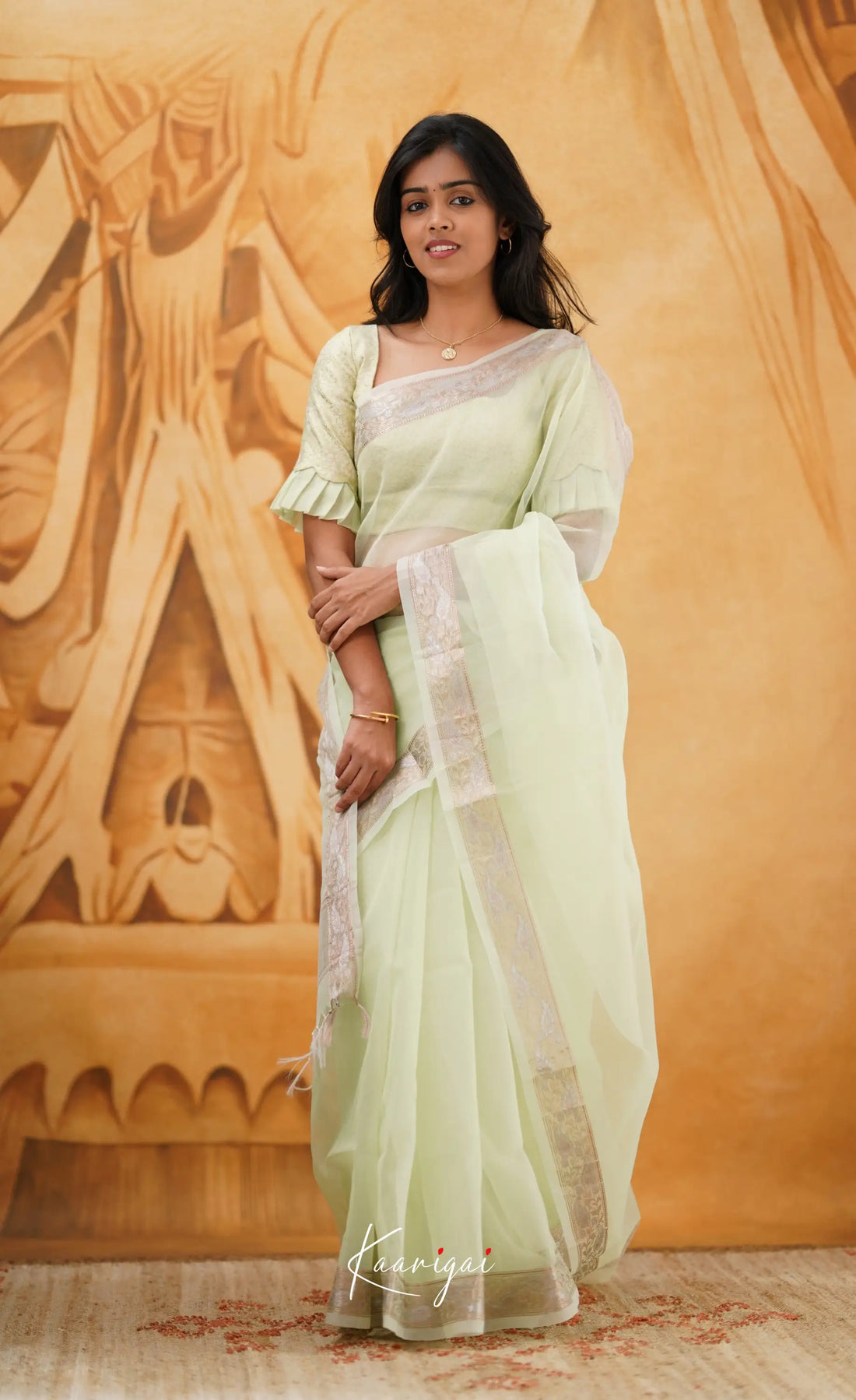 Vinathi- Pastel Green Organza Saree Sarees
